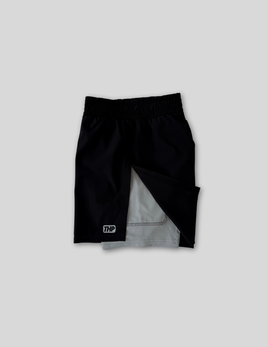 Shorts THP Pace Negro con licra gris The Happiness Project